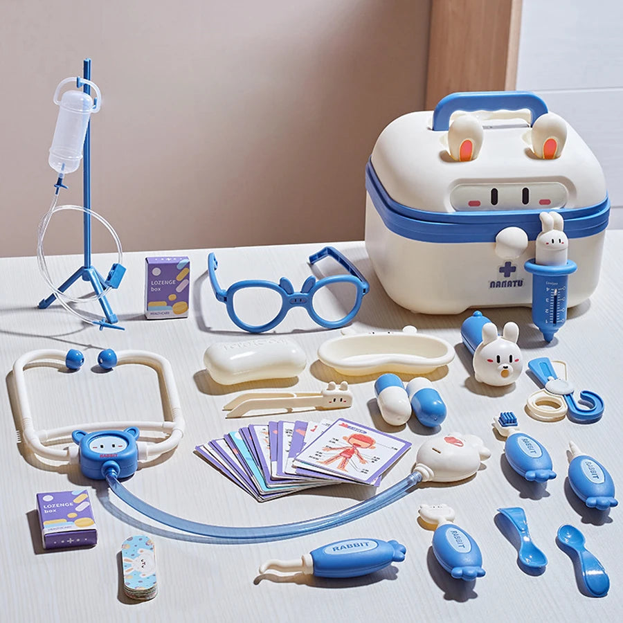A kids doctor play set featuring a white medical kit, stethoscope, various tools, and toy patients.