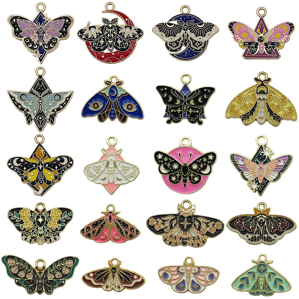 A collection of various butterfly drop charms in gold, silver, and iridescent colors for jewelry making.