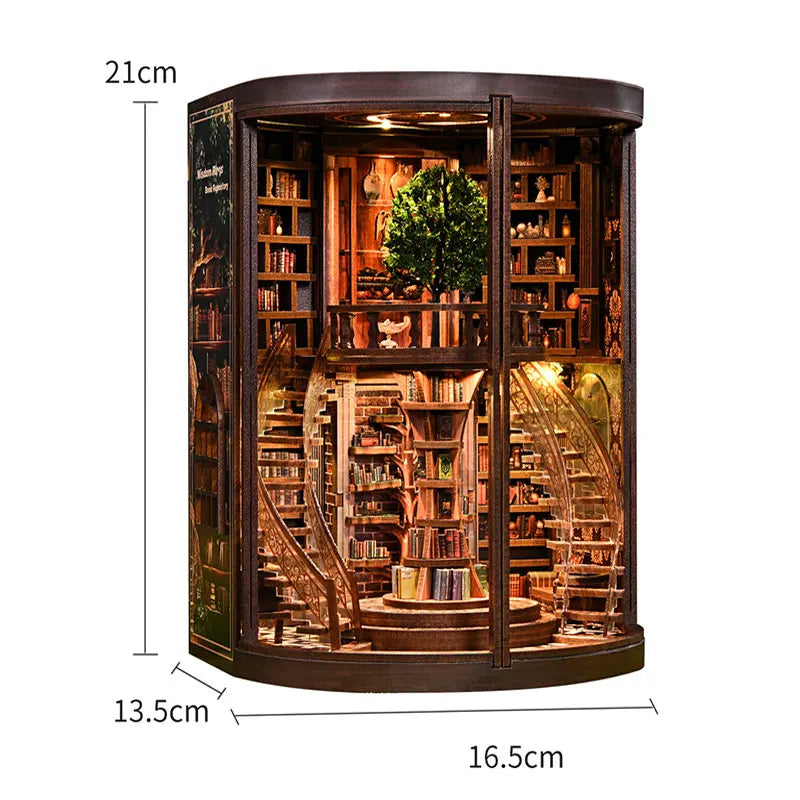 A dark wood book nook kit featuring detailed bookshelves and a miniature tree with internal LED lighting.