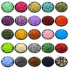 A collection of various colored acrylic round beads for jewelry making, displayed in small black bowls.