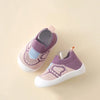 A pair of purple and pink breathable anti-slip baby first walker shoes with knitted texture.