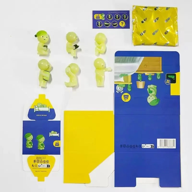 A blind box collectible featuring a yellow elf figurine and related items for a night light series.