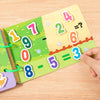 A colorful educational activity board featuring numbers and simple math problems for toddlers.