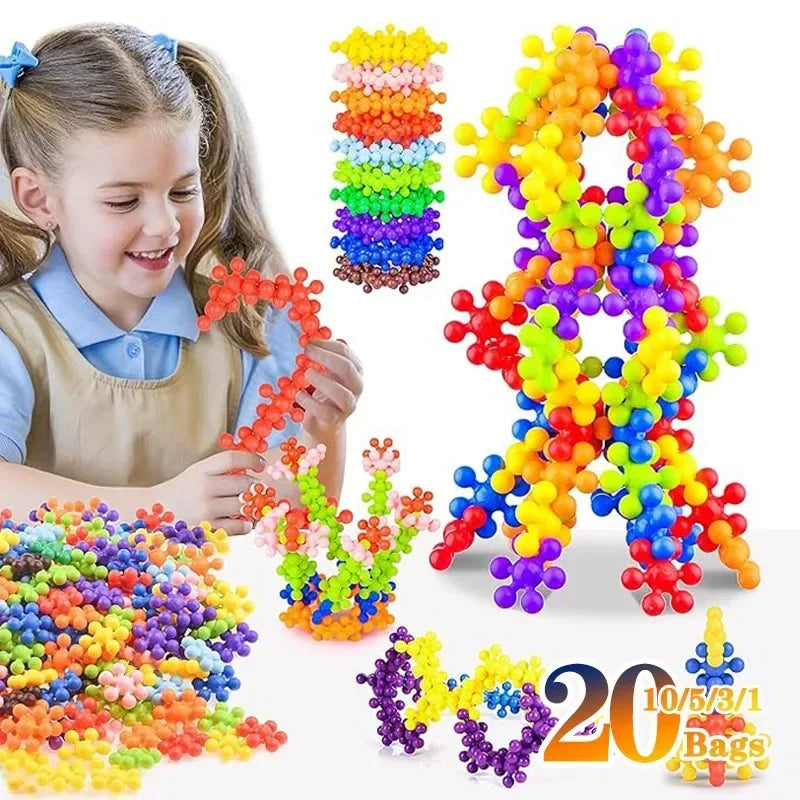 Colorful interlocking plastic building blocks and a girl playing with them.