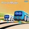 A blue and white Mini Bus toy vehicle is shown in motion on a track, demonstrating Patrol Mode features.