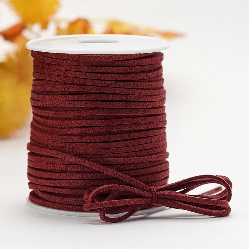 Roll of deep red velvet faux suede braided ribbon for crafting and gift wrapping