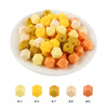 A plate of assorted yellow, orange, and white hexagonal silicone beads for DIY jewelry making