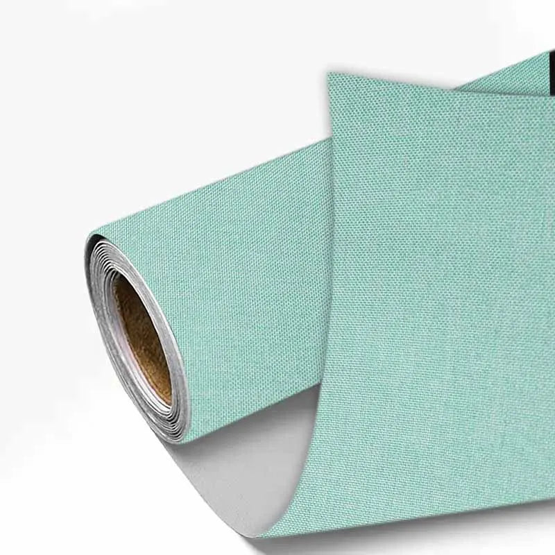 Roll of light mint green linen book binding cloth for albums and scrapbooks