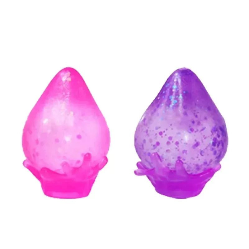 A pair of translucent squishy toys shaped like raindrops in pink and purple.