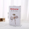 A box containing a wooden kids drum set with various drum pieces and stands.