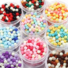 A collection of various colored matte acrylic beads in different shades and sizes for DIY jewelry making