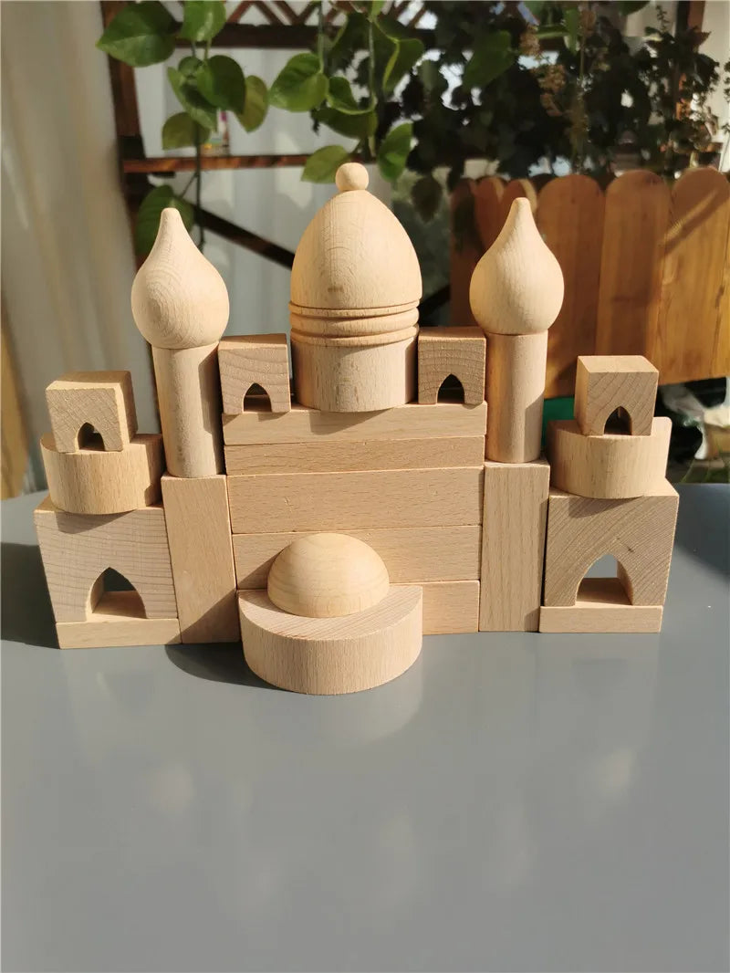 A set of wooden building blocks shaped like a castle and tower, featuring various sizes and an oval gemstone block.