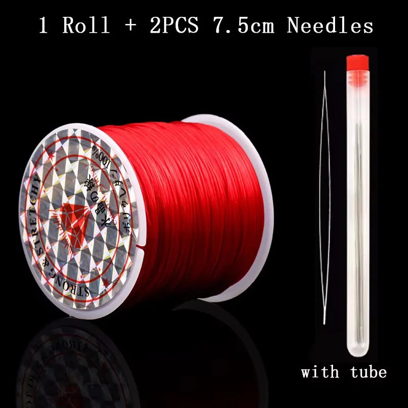A roll of red elastic beading cord with two 7.5cm needles and a clear tube.