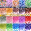 A collection of colorful clear glass seed beads in various shades and sizes for jewelry making