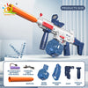 An orange and white toy gun with a blue barrel, featuring detachable batteries, a muffler, bomb drums, magazine tank, and ver