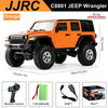 Orange JJRC C8801 Jeep Wrangler RC car with remote control and accessories