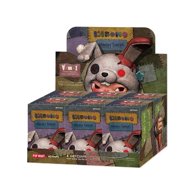 A box of Hirono Monsters Carnival series collectible figures featuring a gray, rabbit-like monster character.