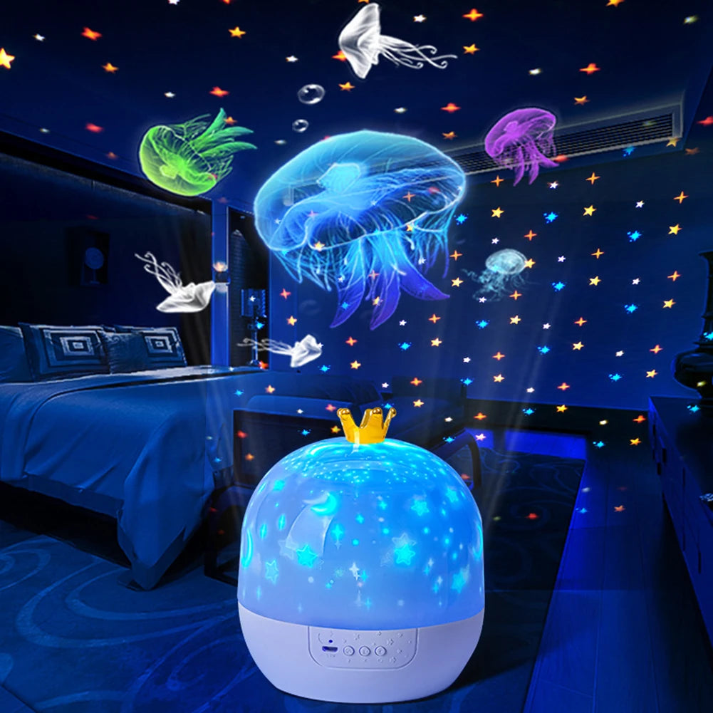 A blue spherical projector casts a starry sky and glowing jellyfish patterns onto a dark room.