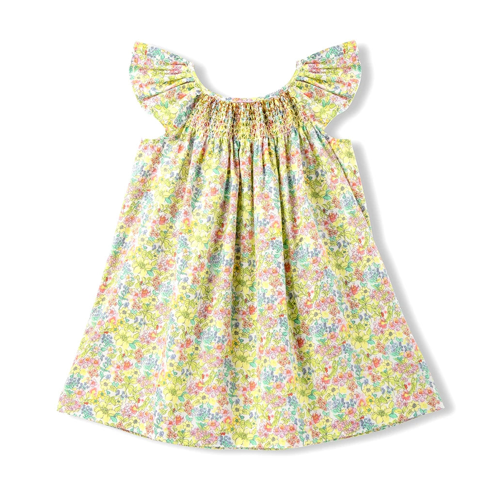 A yellow and pink floral smocked summer dress for girls with flying sleeves.