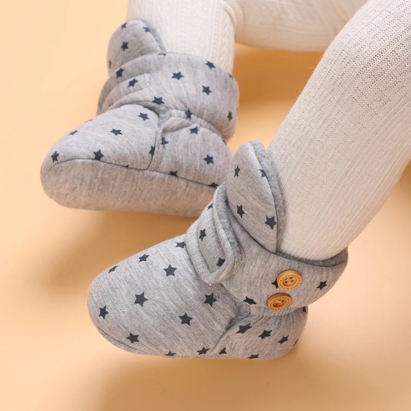 Gray plush baby snow boots for girls and boys with a patterned fabric and anti-slip sole
