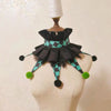 Black and teal checkered ruffle collar accessory for a costume