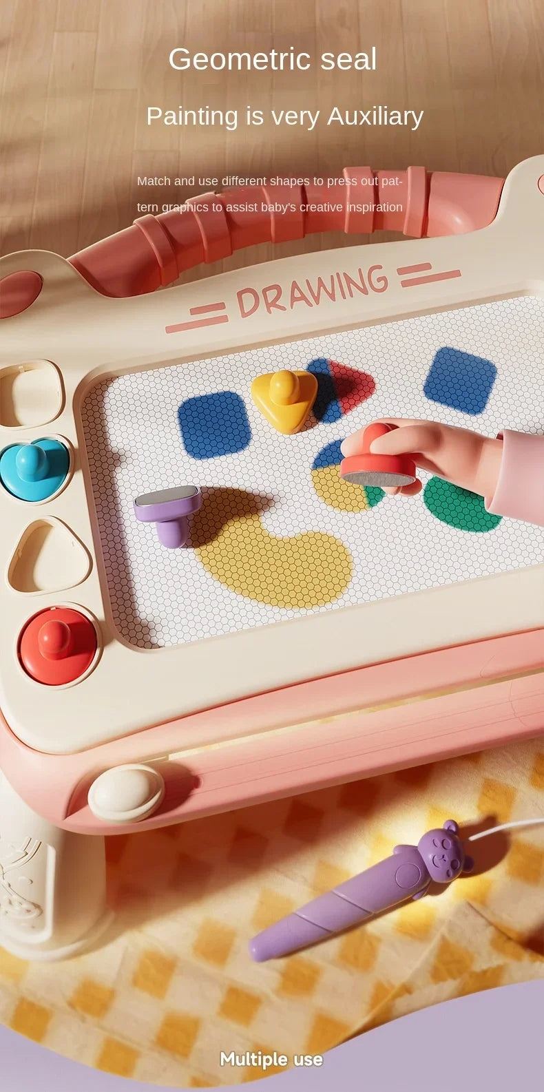 A pink magnetic drawing board with various shapes and colors used for artistic inspiration.