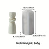 A white silicone candle mold with a twisted ribbed design, measuring 9 cm in height and weighing 360g.