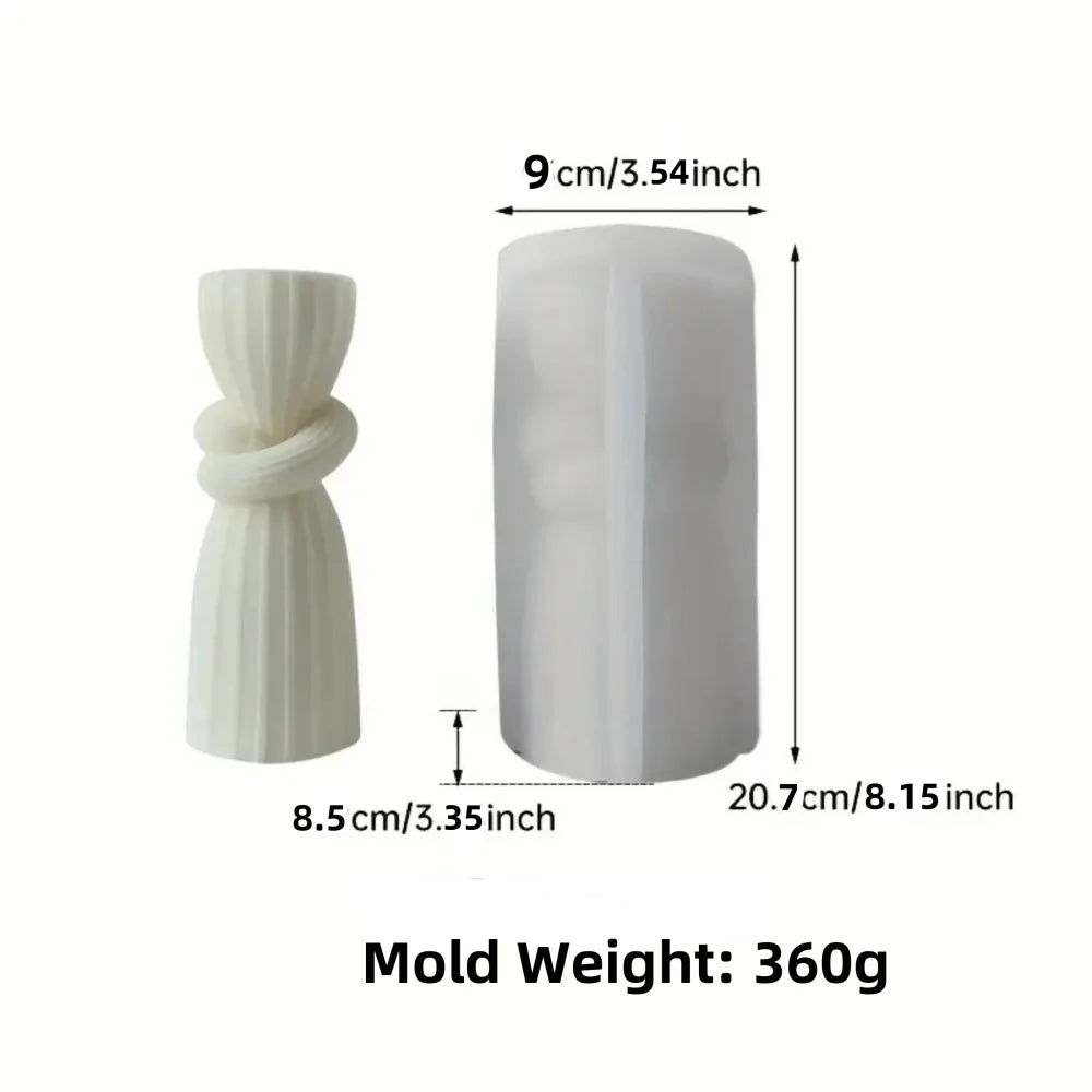 A white silicone candle mold with a twisted ribbed design, measuring 9 cm in height and weighing 360g.