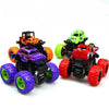 A collection of colorful friction-powered monster truck toys in various colors and designs.