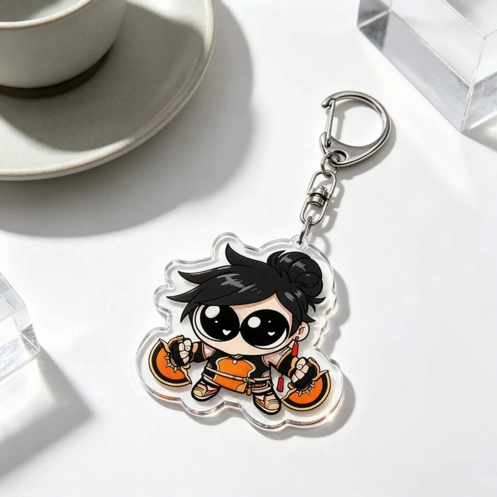 An anime-inspired acrylic keychain charm featuring a cute girl character with black hair and orange clothing.