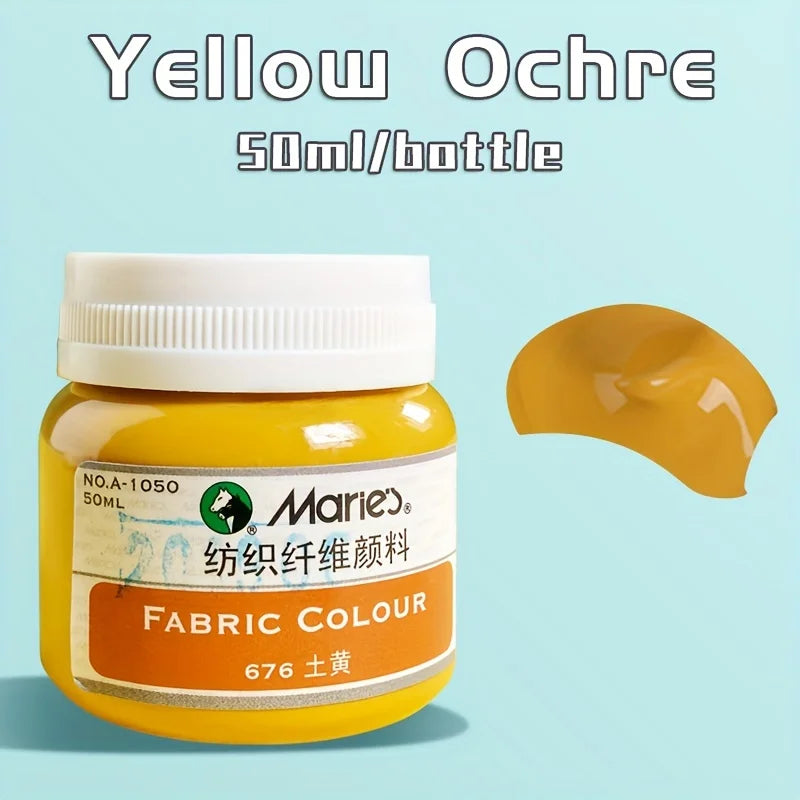 A bottle of yellow ochre fabric colour labeled Marie's 676 ochre with a swatch of the paint.