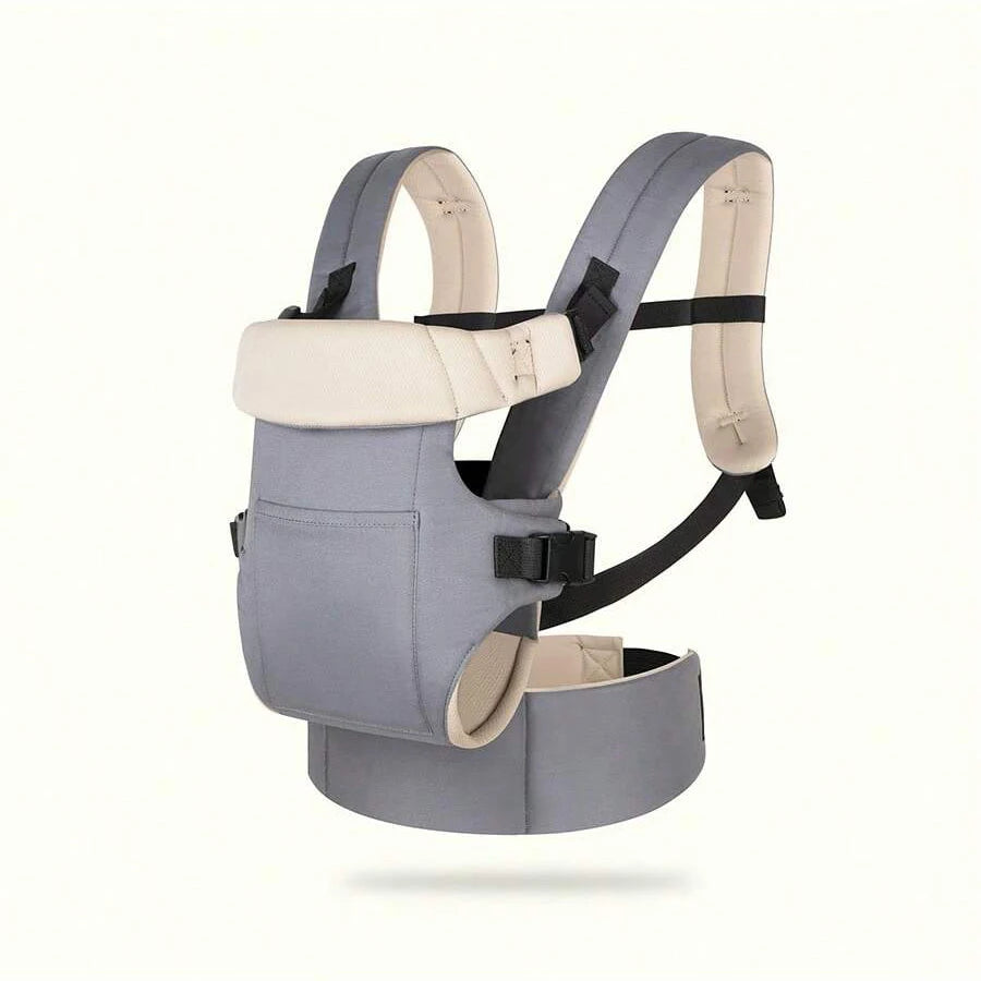 A light gray adjustable front and back baby carrier with beige padding and black straps.