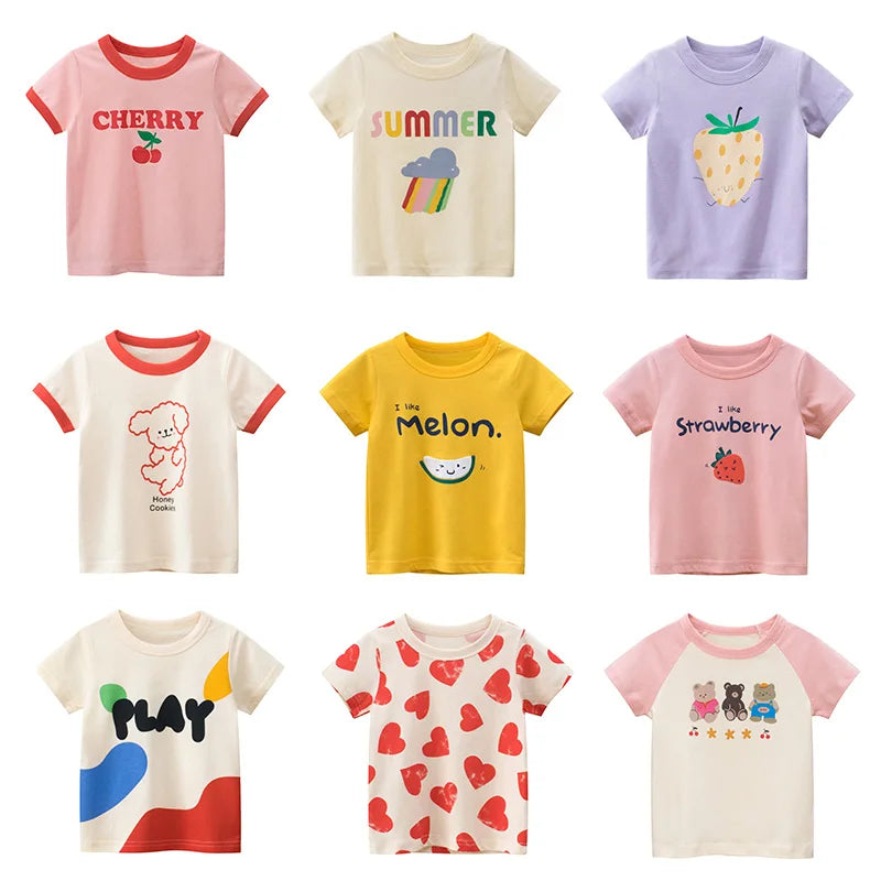 A collection of nine short-sleeve cotton t-shirts for girls featuring various fruit designs like cherry, summer, lemon, melon
