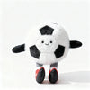 A white plush sports ball with black panels and red accents, resembling a mini basketball or soccer ball.