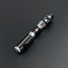 A black lightsaber with a silver hilt and blue and red lights visible on the blade tip.