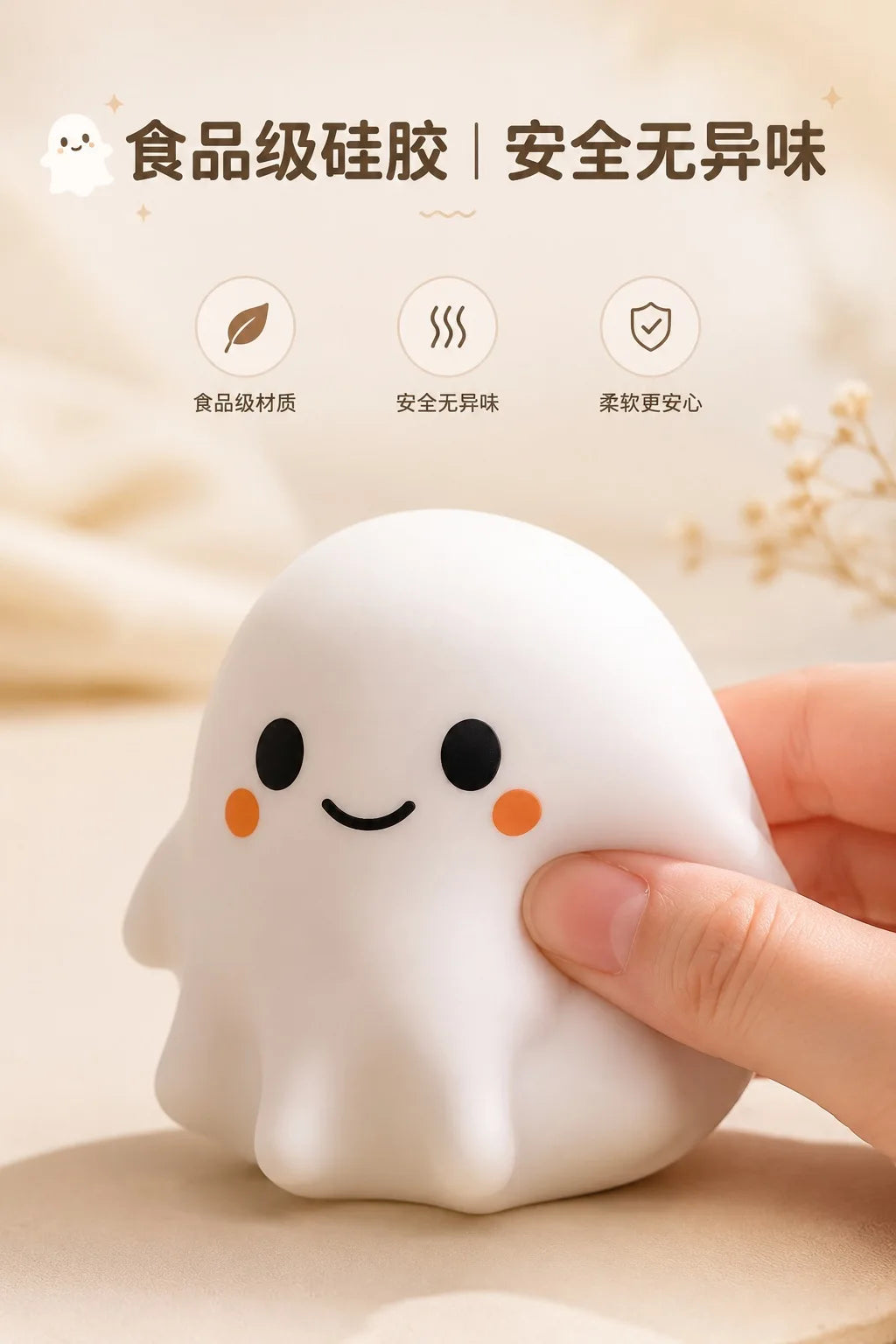 A white, squishy ghost-shaped stress ball is being held by a hand, emphasizing food-grade safety and fragrance-free features.