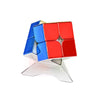 A magnetic 3x3 speed cube with red and blue faces, resting on a clear base.