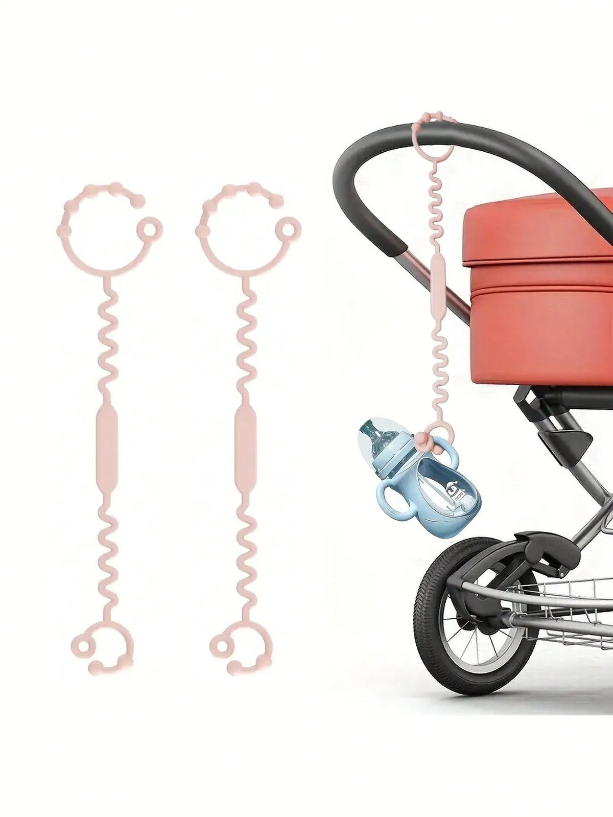 Un tétine anti-chute en silicone rose et bleu suspendue à un porte-bébé rouge.