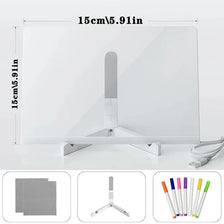 A white glowing LED message board with a silver stand and several color pens and an eraser displayed on a white surface.