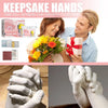 A couple is shown with a bouquet of flowers and a gift box, alongside hands demonstrating the use of a 3D hand and foot print