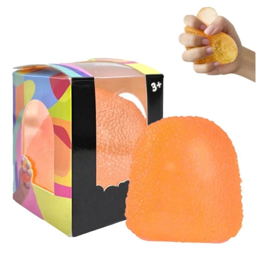 A box of orange squishy stress balls and a hand holding a yellow fidget toy.