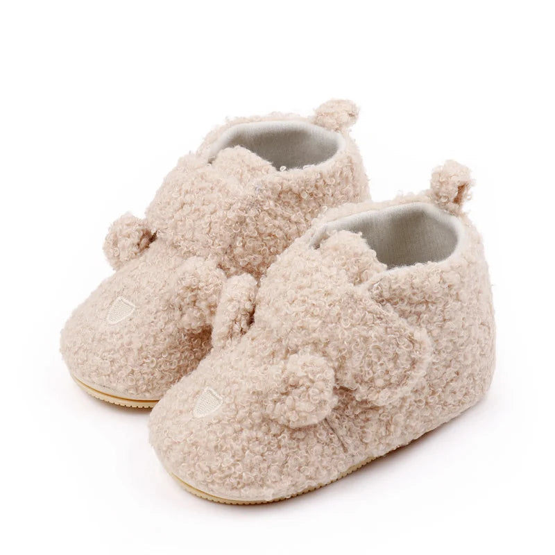 Pair of light beige fuzzy bear design baby prewalker shoes with a soft anti-slip sole