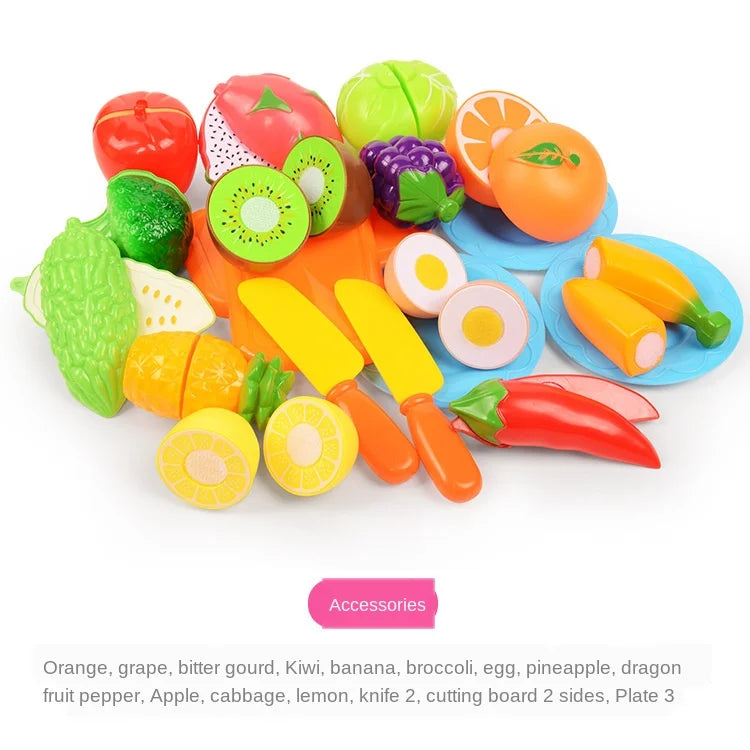 An assortment of 81 pieces of pretend play food including fruits and vegetables like orange, grape, kiwi, and pepper on a cut