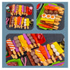 A colorful kids pretend play BBQ grill set featuring various toy food items like sausages, fruits, and vegetables.