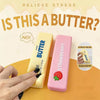 Two squishy stress relief toys are shown, one yellow labeled Butter and one pink labeled Strawberry, with a hand holding them
