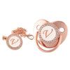 Rose gold bling baby pacifier clip featuring a silicone holder and a decorative V charm