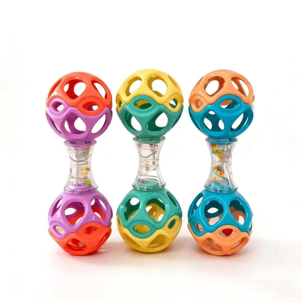 Three colorful soft rubber teething and grasping rattle toys in pink, green, and orange.