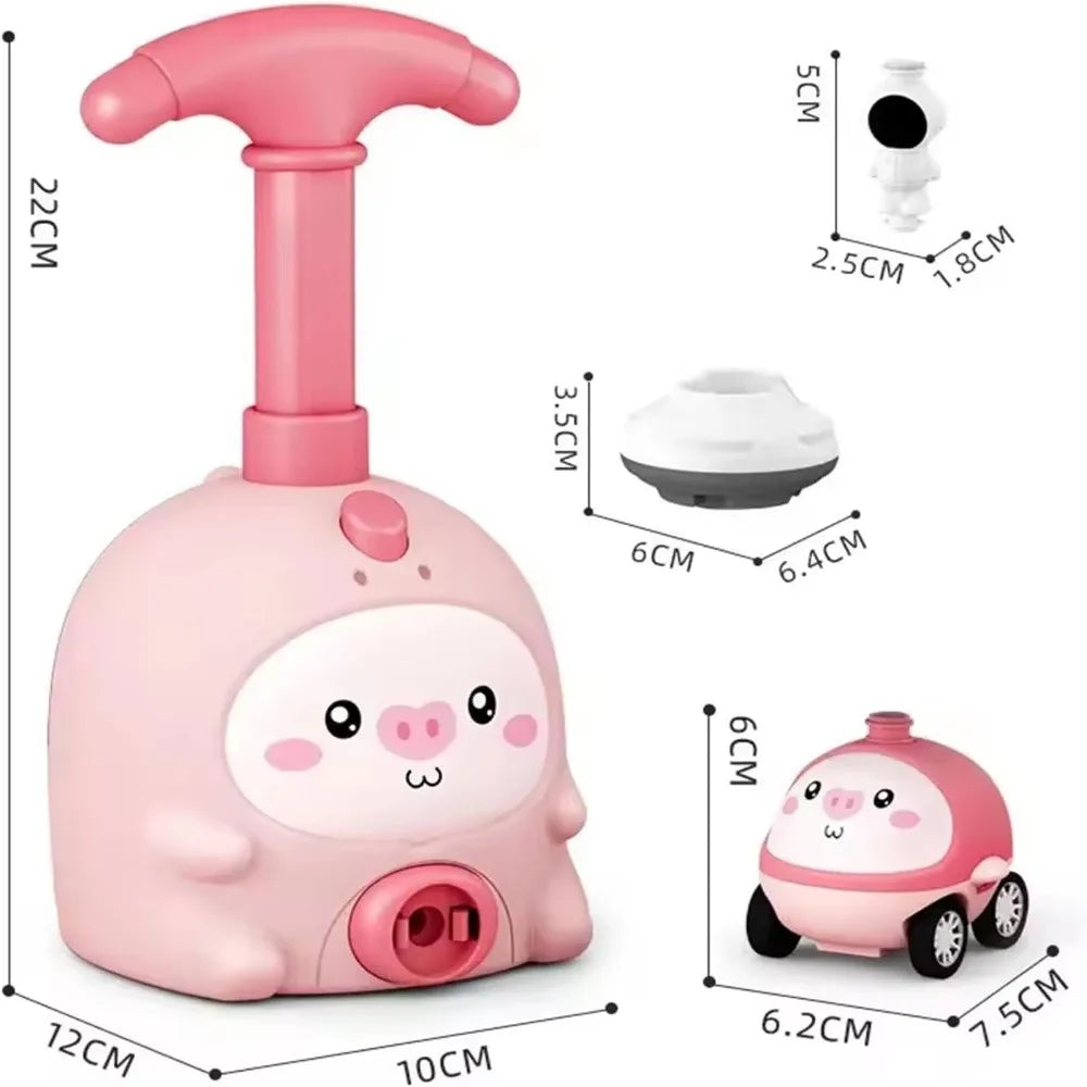 A pink balloon-powered racing car toy with a launcher and a small white figure, shown from multiple angles.