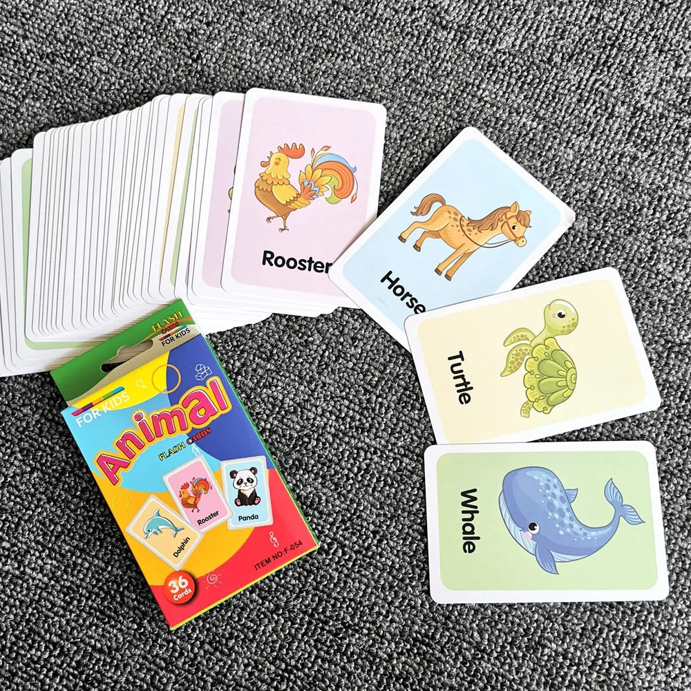 A collection of colorful animal flash cards including a rooster, horse, turtle, and whale.