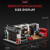Size display of a vintage American garage building blocks set featuring tools and machinery.